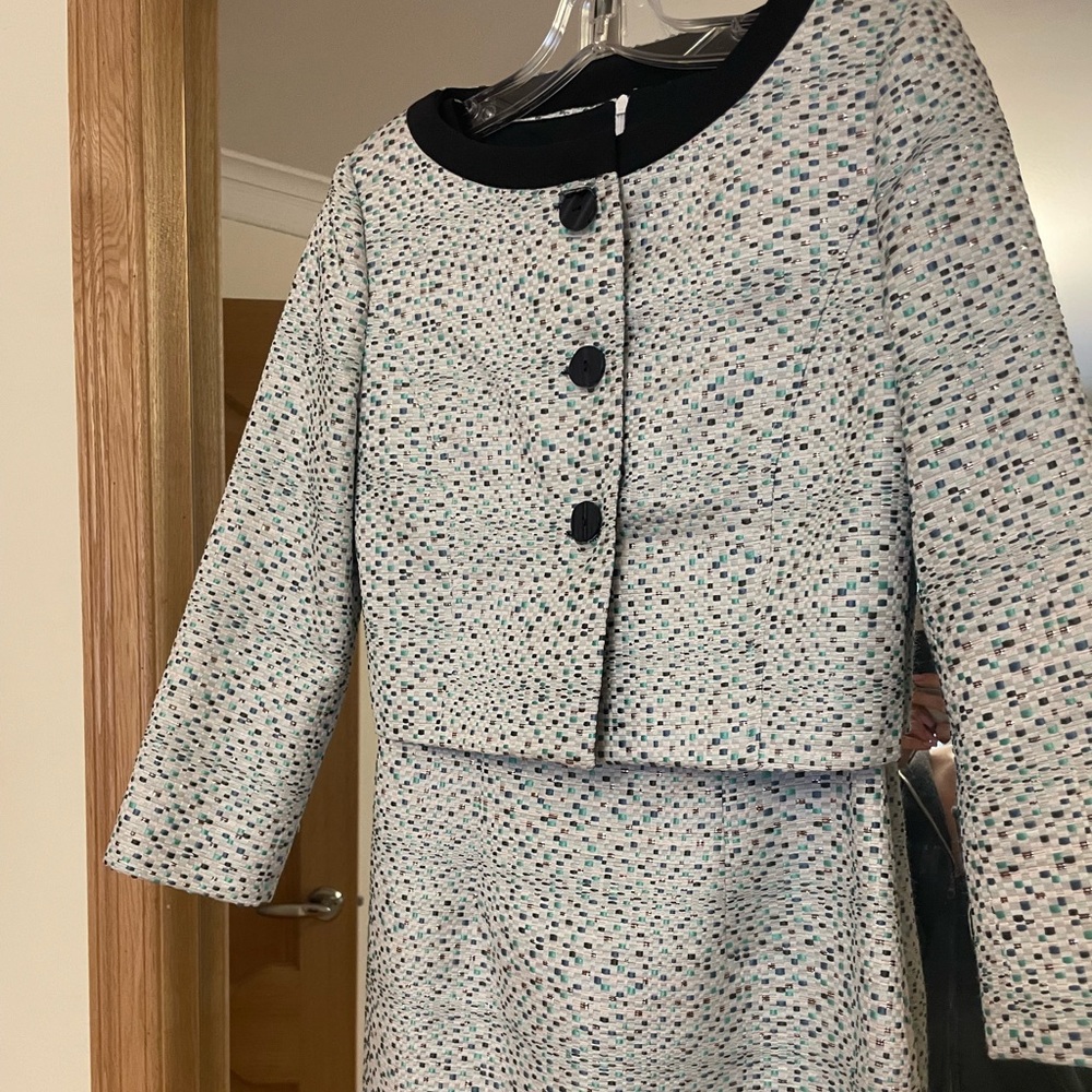 Two piece dress/jacket. Very elegant
